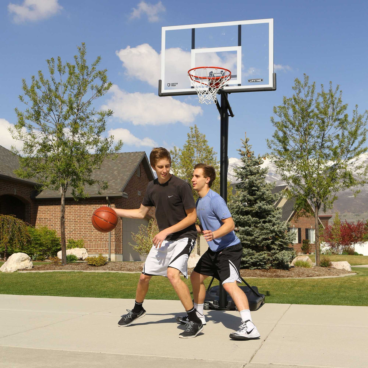 Lifetime 7.5ft. - 10ft. Adjustable Height 54 inch Steel-Framed Shatterproof Outdoor Portable Basketball System (90631)