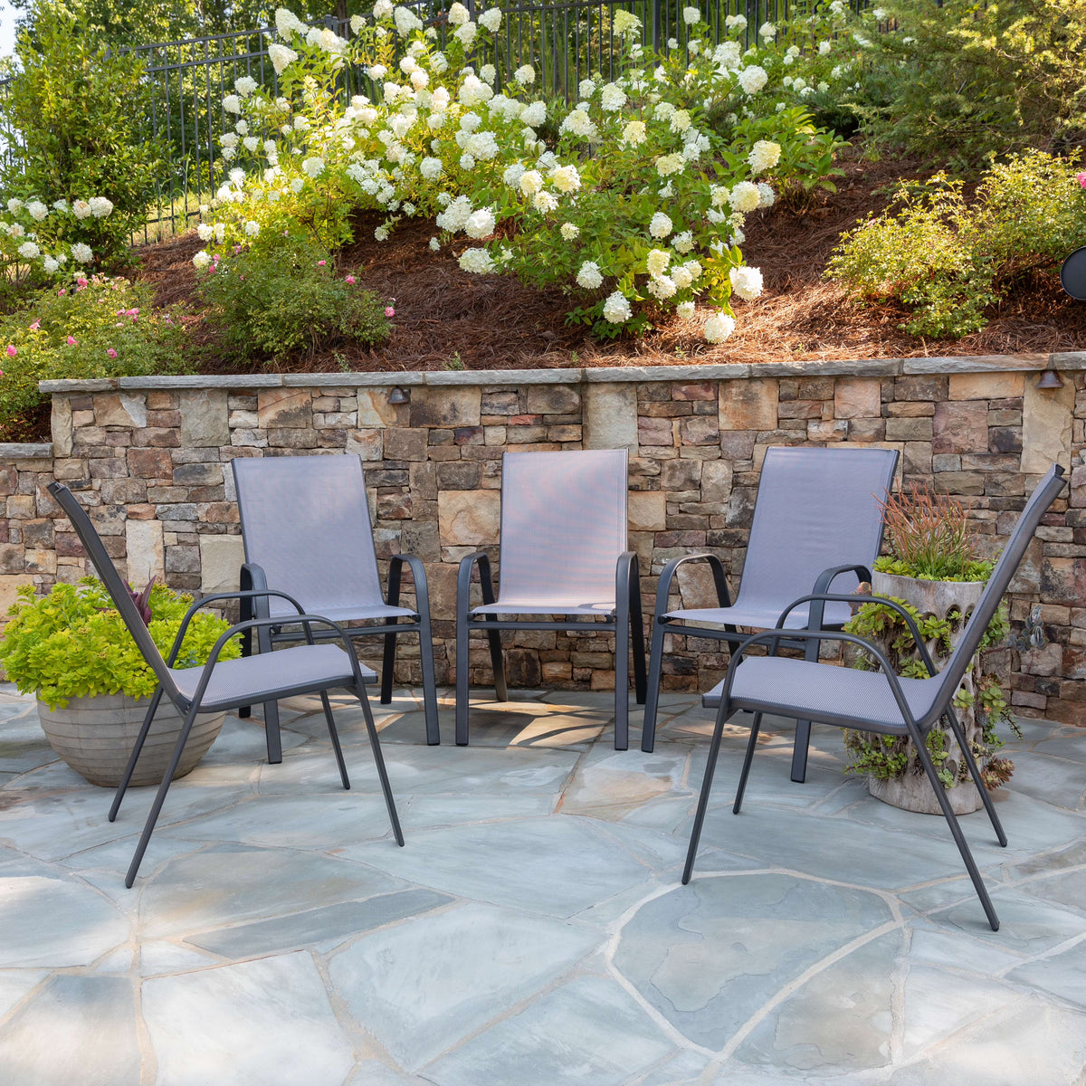 BizChair 5 Pack Black Outdoor Stack Chair with Flex Comfort Material and Metal Frame