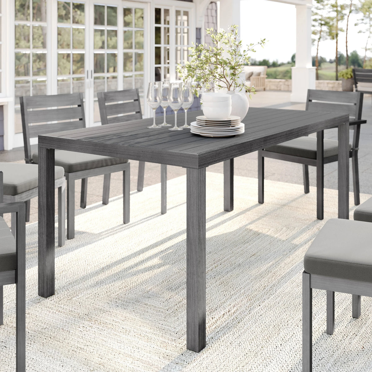 Martha Stewart 71" Indoor-Outdoor Patio Table with Gray Brushed Woodgrain Aluminum Finish