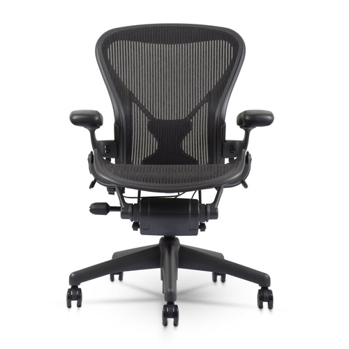 Herman Miller Aeron Chair Size B (𝙍𝙚𝙛𝙪𝙧𝙗𝙞𝙨𝙝𝙚𝙙) �?Fully Loaded PostureFit Clip‑Latch Adjustable Arms and 12‑Year Warranty along with 3 Yr Mechanical Warranty